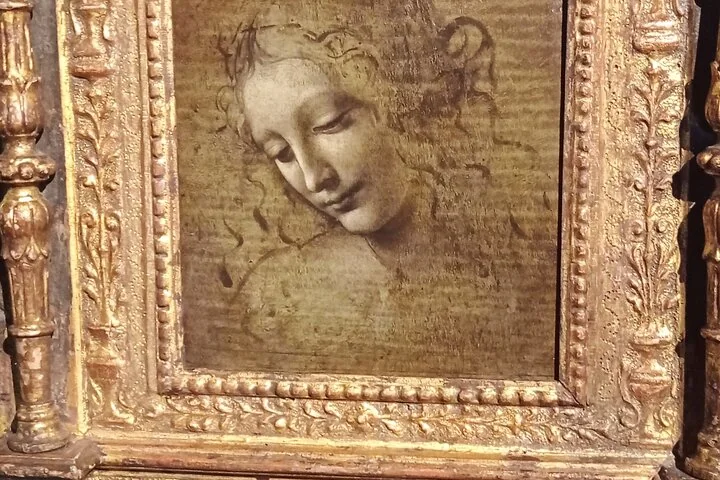La Scapigliata di Leonardo da Vinci, schizzo della testa di una giovane donna, in una cornice dorata